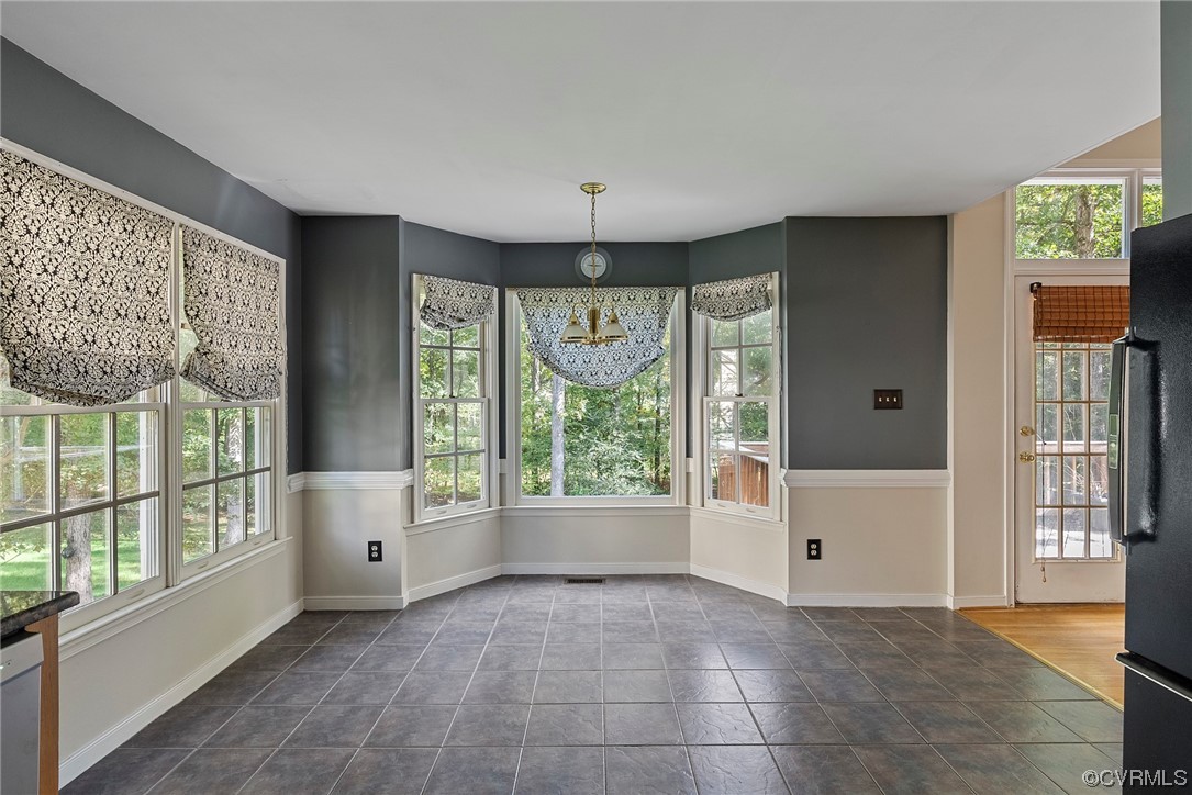 5407 Chestnut Bluff Road Midlothian, VA 23112 - Photo 14 of 35 a view of an empty room with a window