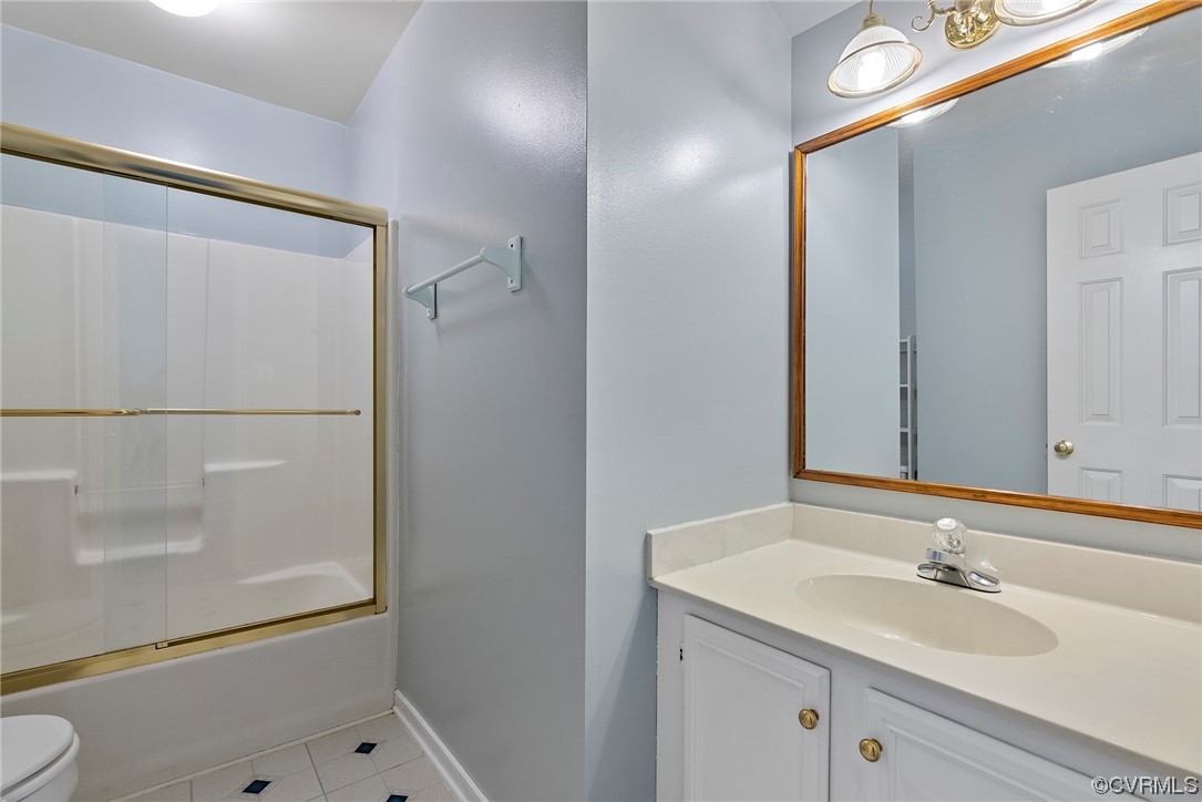 5407 Chestnut Bluff Road Midlothian, VA 23112 - Photo 30 of 35 a bathroom with a granite countertop sink toilet and shower