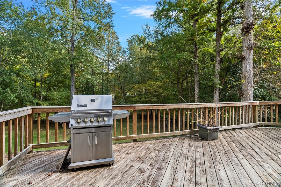5407 Chestnut Bluff Road Midlothian, VA 23112 - Photo 32 of 35 a view of a deck with wooden floor and fence