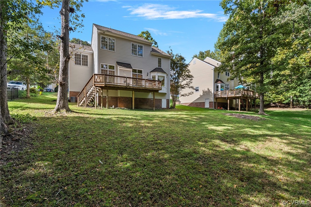 5407 Chestnut Bluff Road Midlothian, VA 23112 - Photo 35 of 35 a view of a house with a big yard