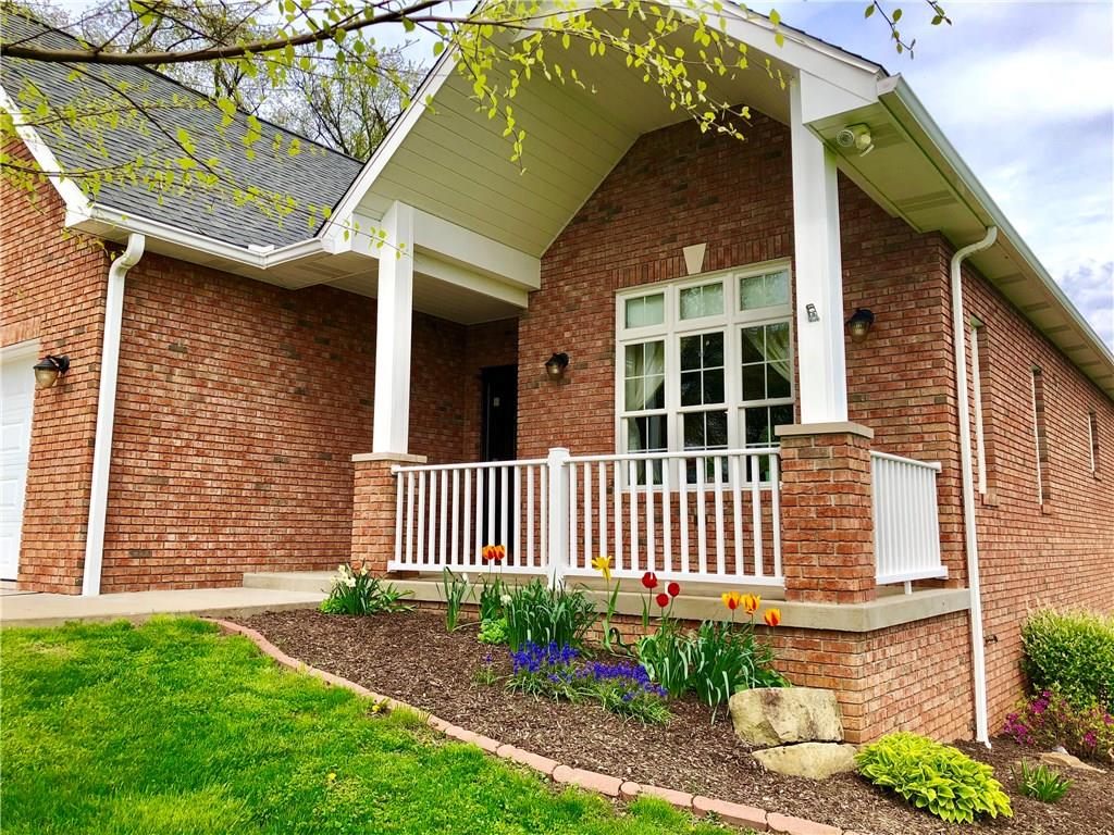 182 Arner Road Freeport, PA 16229 - Photo 3 of 25 Enjoy relaxing out on your front porch and smell the flowers while you are out there!