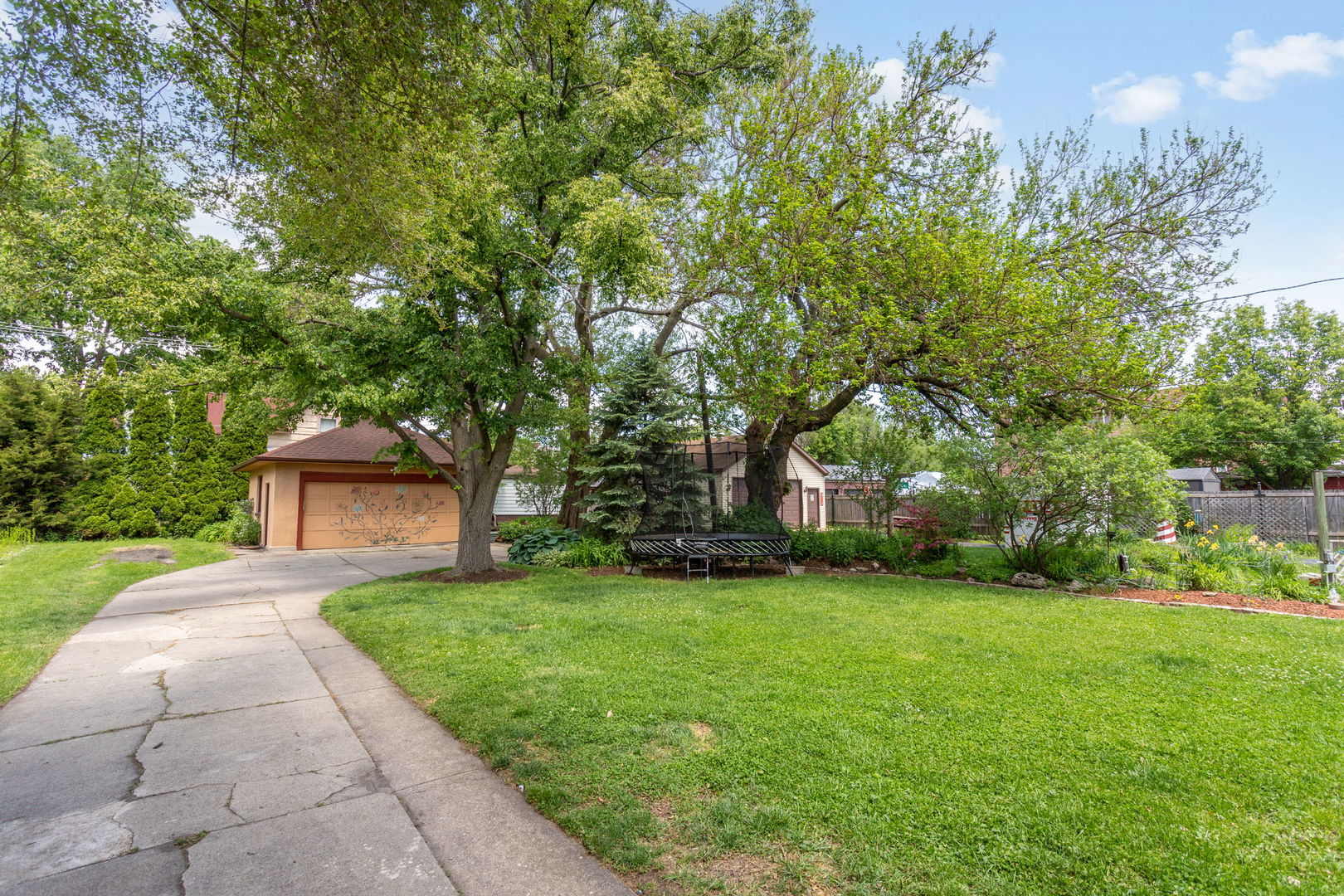 342 Lawton Road Riverside, IL 60546 - Photo 26 of 33 a front view of a house with a yard and trees