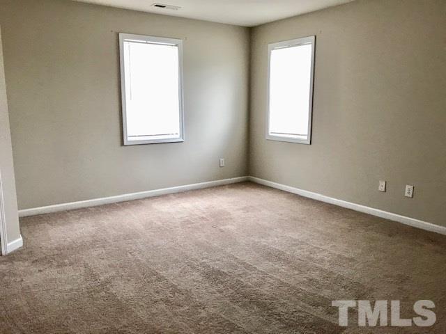 3832 Pin Oak Road Raleigh, NC 27604 - Photo 11 of 14 an empty room with a window