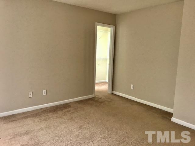 3832 Pin Oak Road Raleigh, NC 27604 - Photo 12 of 14 an empty room with window