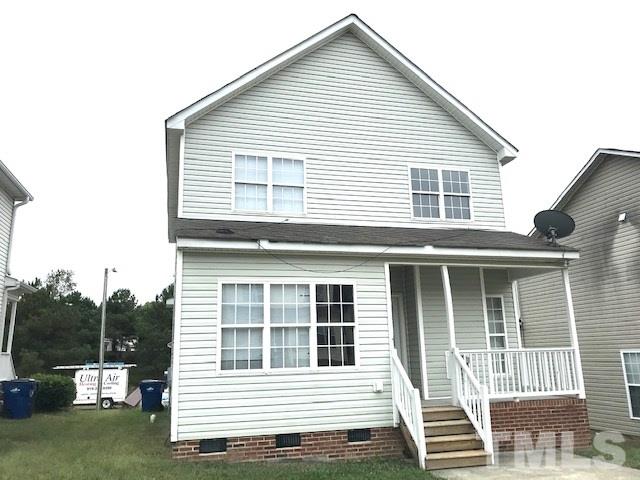 3832 Pin Oak Road Raleigh, NC 27604 - Photo 13 of 14 a view of a house with backyard and porch