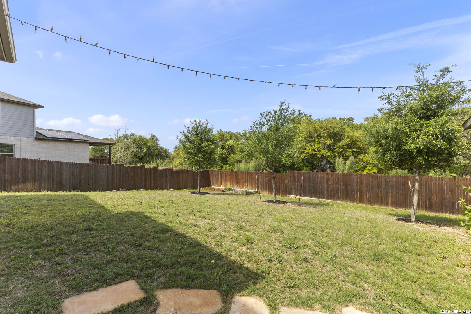 12221 Icon Ridge San Antonio, TX 78253 - Photo 41 of 46 a swimming pool with wooden fence