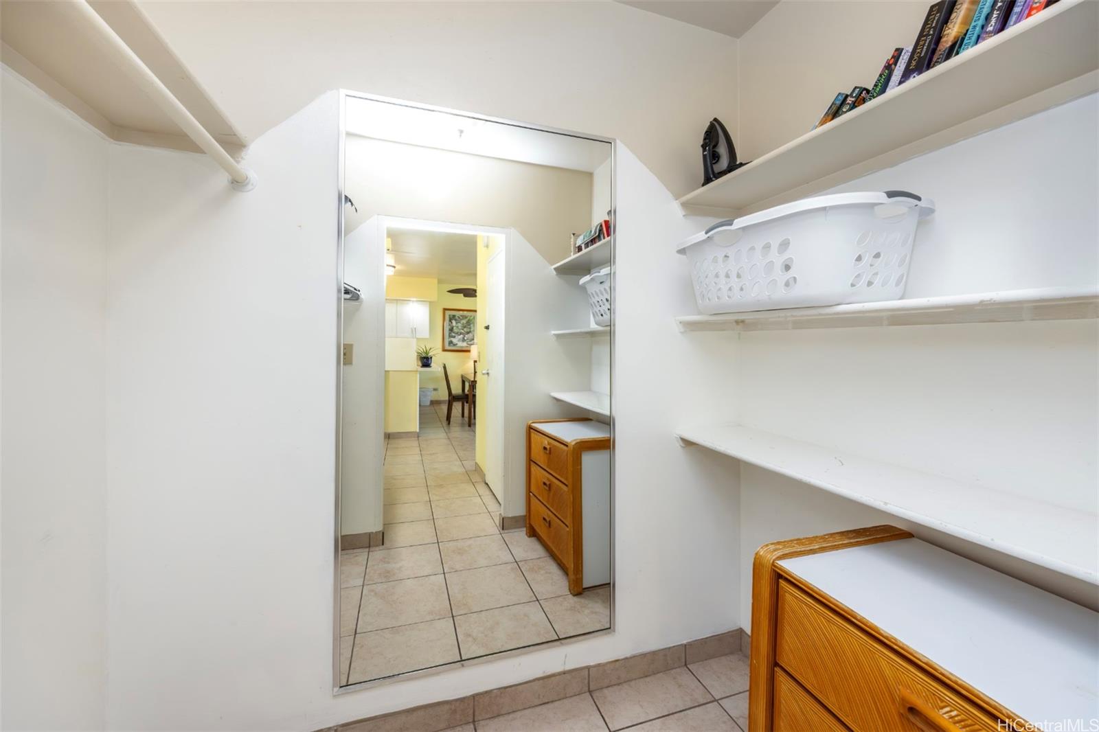 2161 Kalia Road, Unit 218 Honolulu, HI 96815 - Photo 16 of 25 a view of walk in closet with clothes and shoes