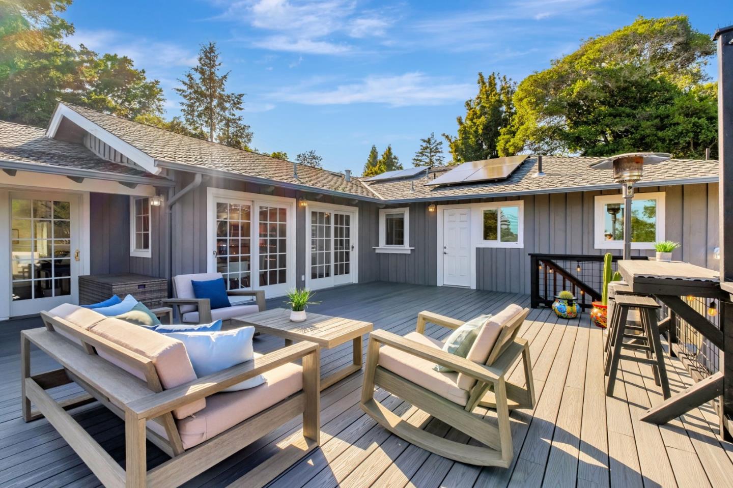 770 Graham Hill Road Santa Cruz, CA 95060 - Photo 58 of 83 a view of a patio with couches chairs and wooden floor