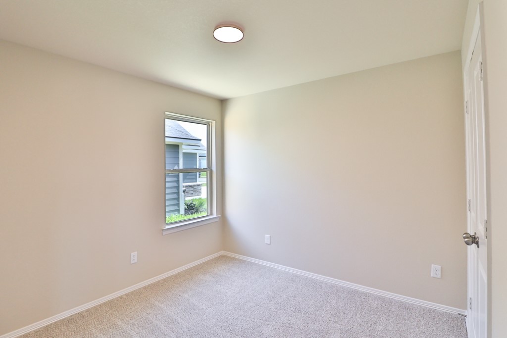 2871 Messenger Way Bryan, TX 77803 - Photo 11 of 13 an empty room with windows