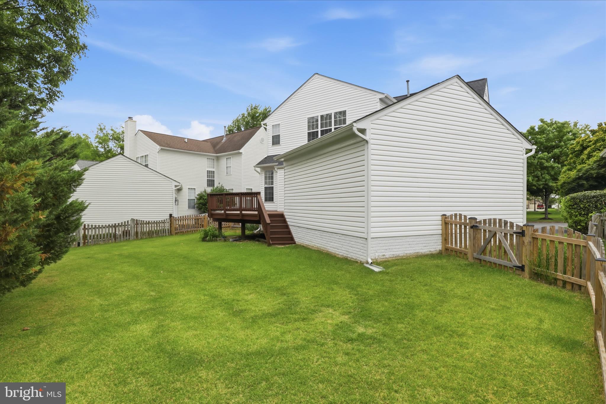 25352 Ripleys Field Drive Chantilly, VA 20152 - Photo 32 of 54 a view of a house with a backyard