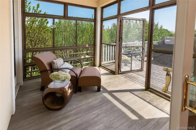 a bedroom with furniture and a window