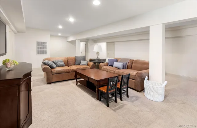 a living room with furniture and a couch