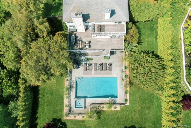 an aerial view of a house with a garden
