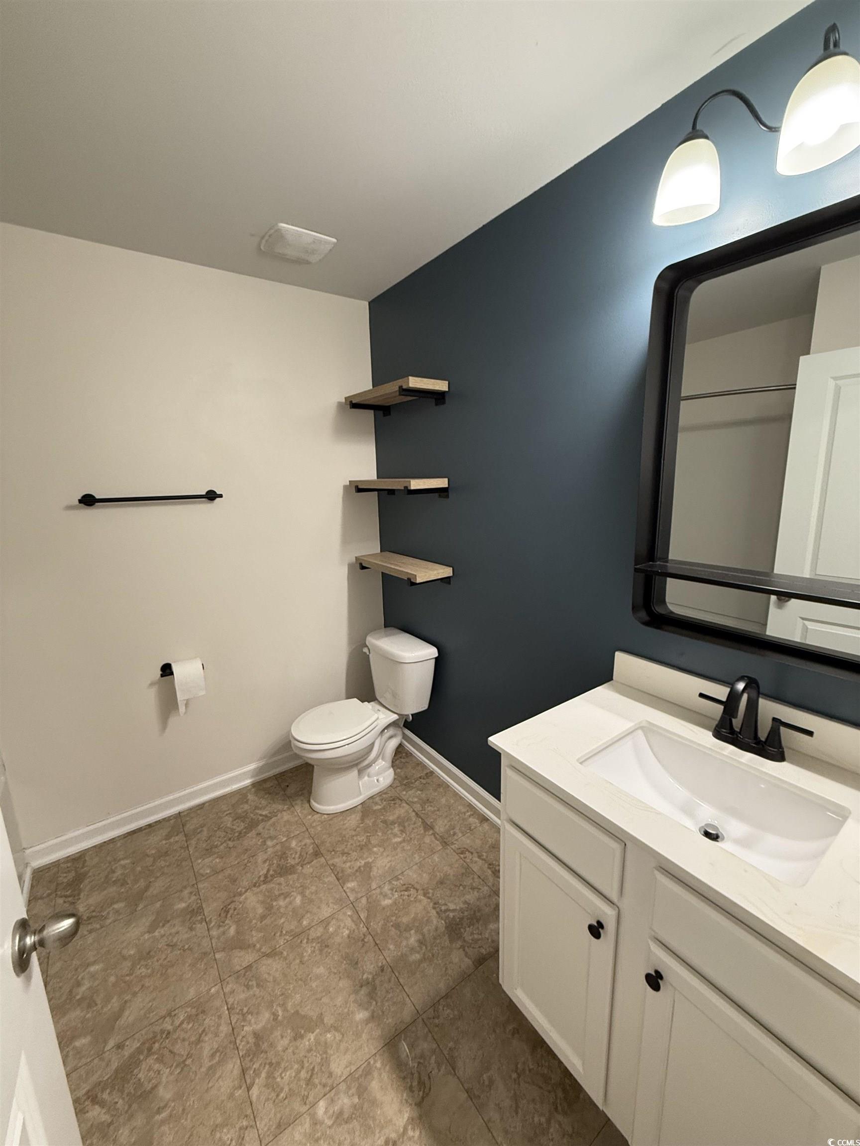 462 Quinta Street Longs, SC 29568 - Photo 24 of 39 Bathroom featuring vanity and toilet