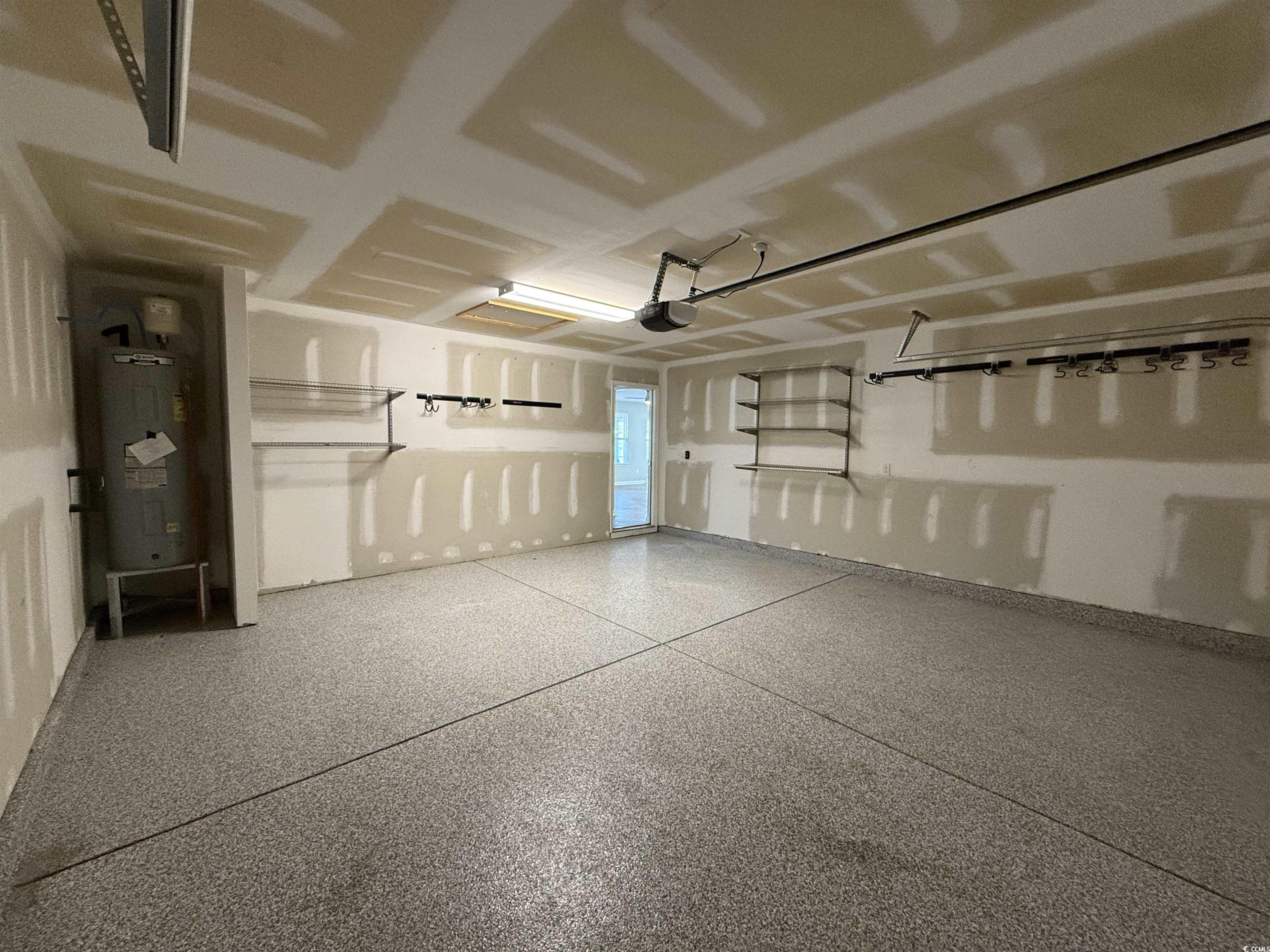 462 Quinta Street Longs, SC 29568 - Photo 29 of 39 Garage with electric water heater