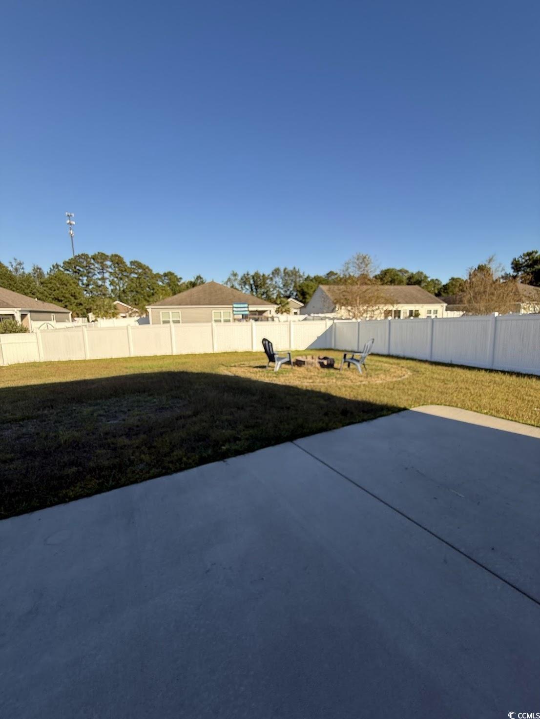 462 Quinta Street Longs, SC 29568 - Photo 33 of 39 Fenced backyard with a patio