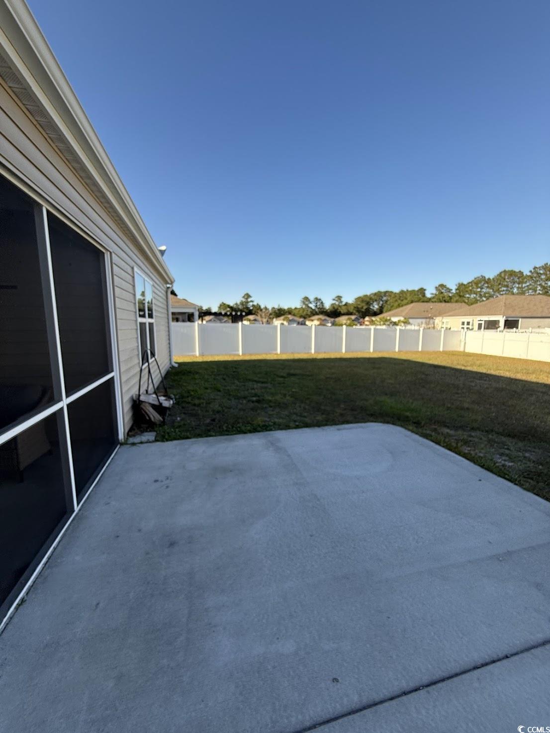 462 Quinta Street Longs, SC 29568 - Photo 34 of 39 Fenced backyard with a patio