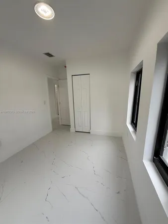 a view of a hallway with window