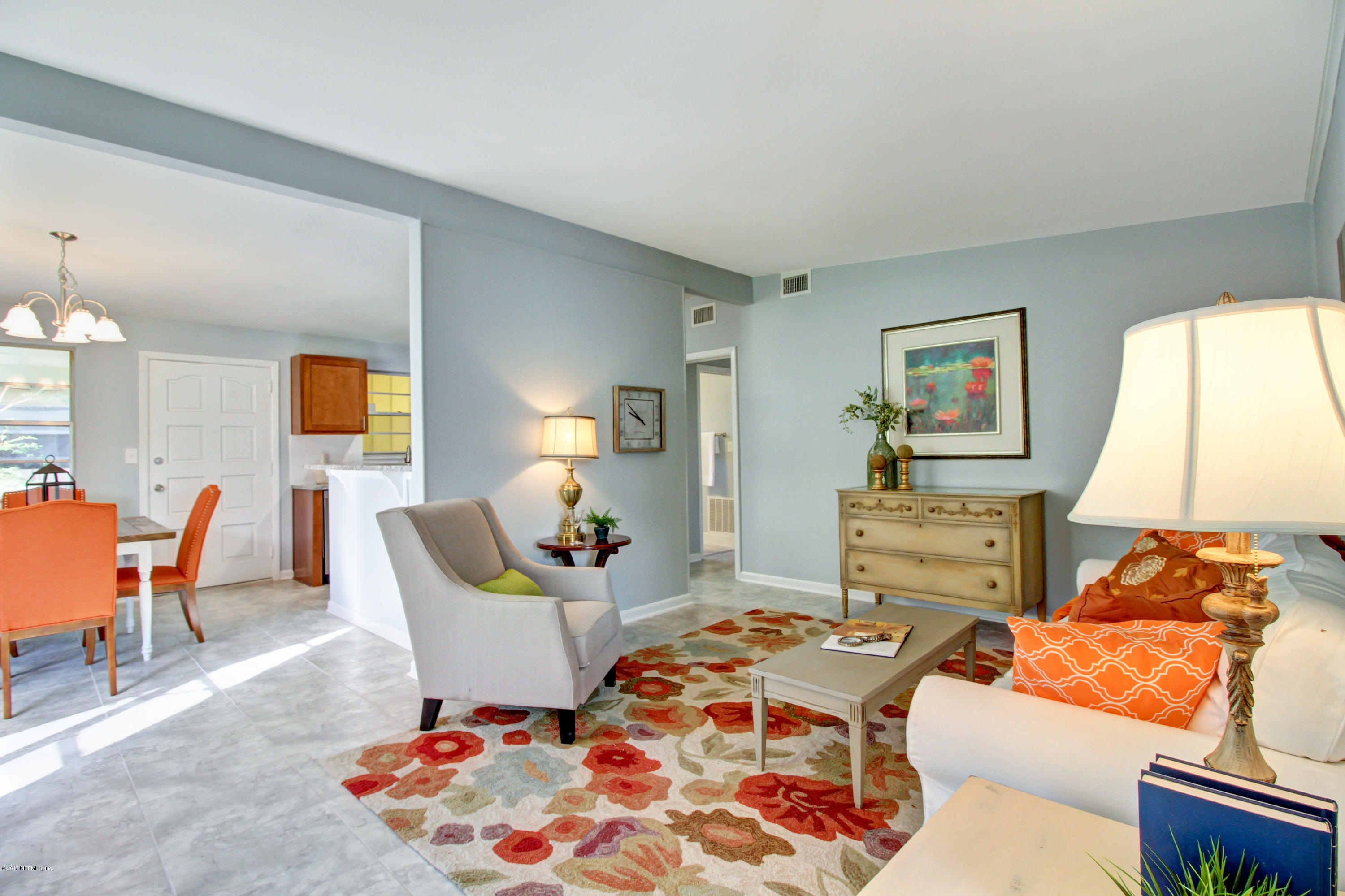 7003 Arques Road Jacksonville, FL 32205 - Photo 11 of 24 a bedroom with a bed and wooden floor
