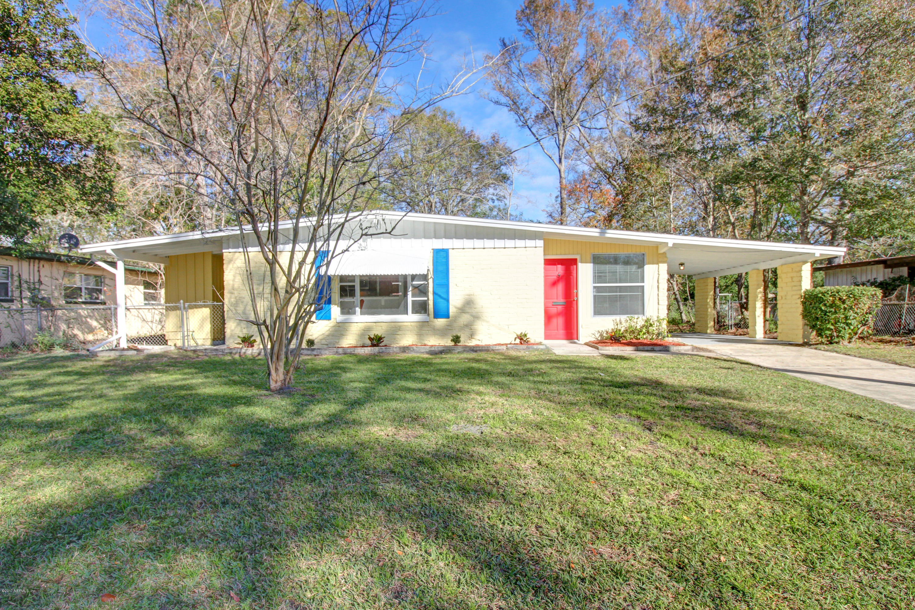 7003 Arques Road Jacksonville, FL 32205 - Photo 3 of 24 a view of a house with a backyard