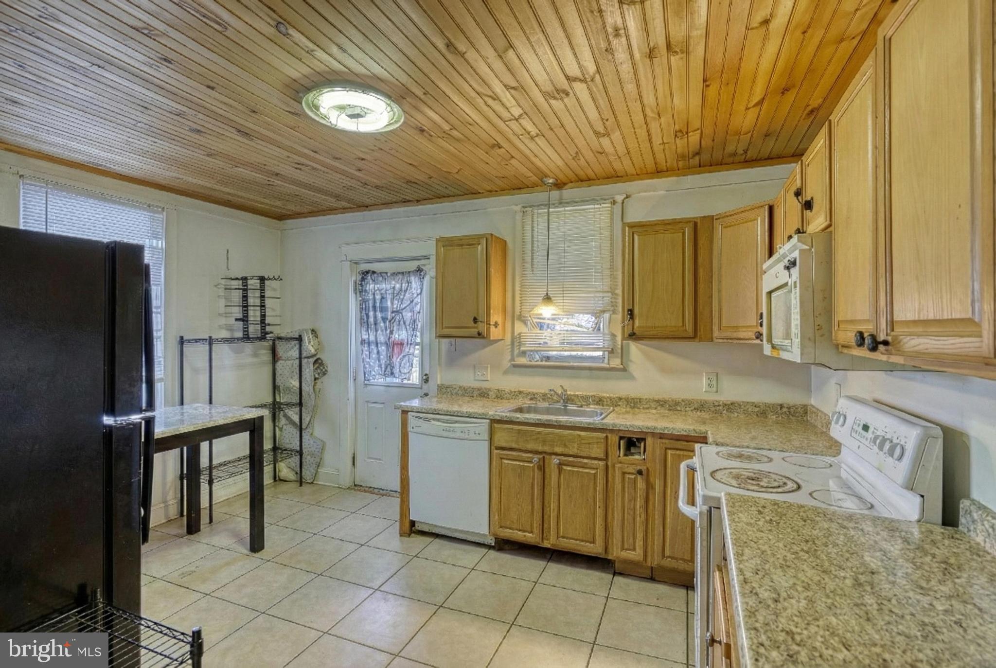 619 Dallas Street York, PA 17403 - Photo 11 of 23 a bathroom with a sink a toilet and mirror