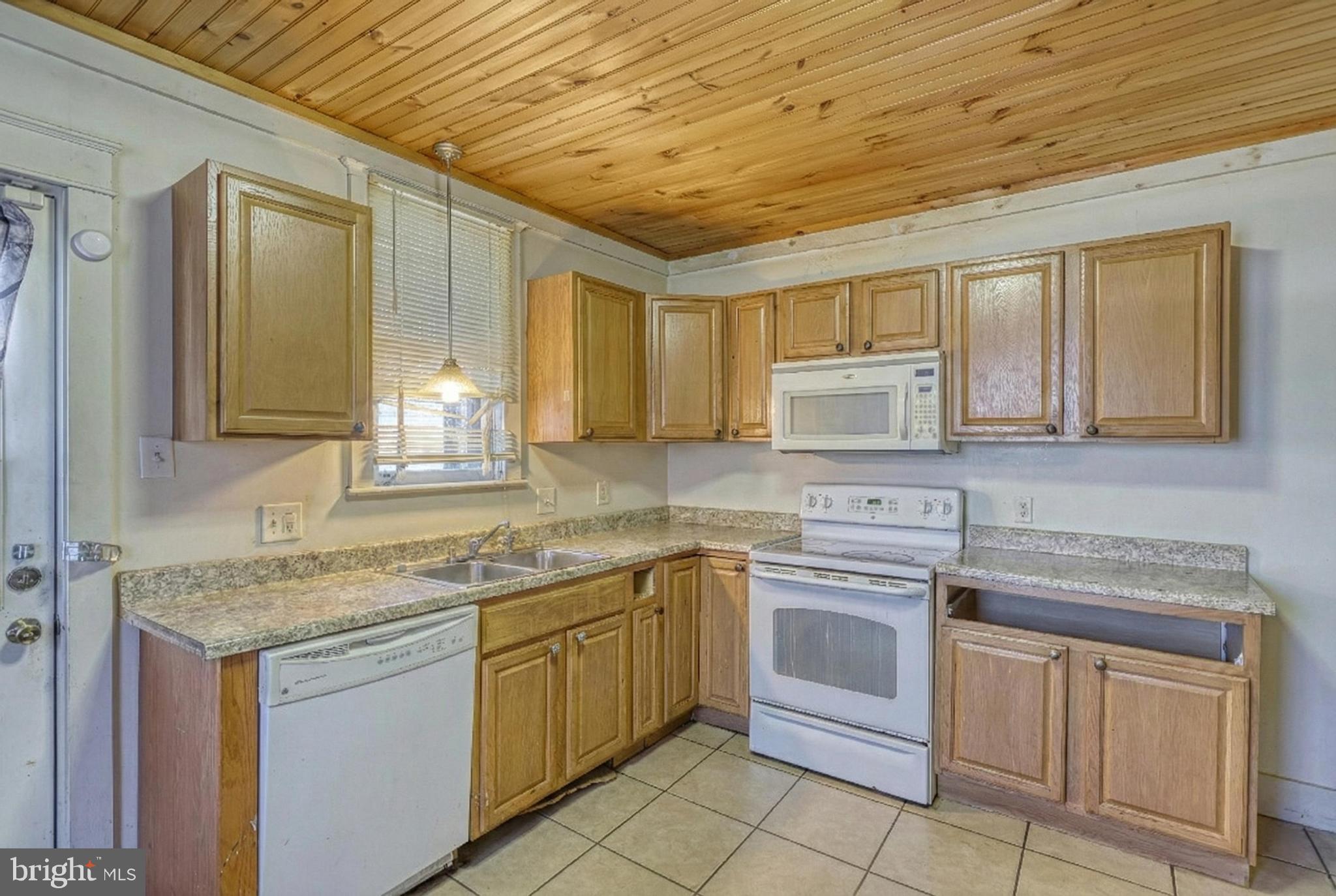 619 Dallas Street York, PA 17403 - Photo 14 of 23 a kitchen with a sink stove and cabinets