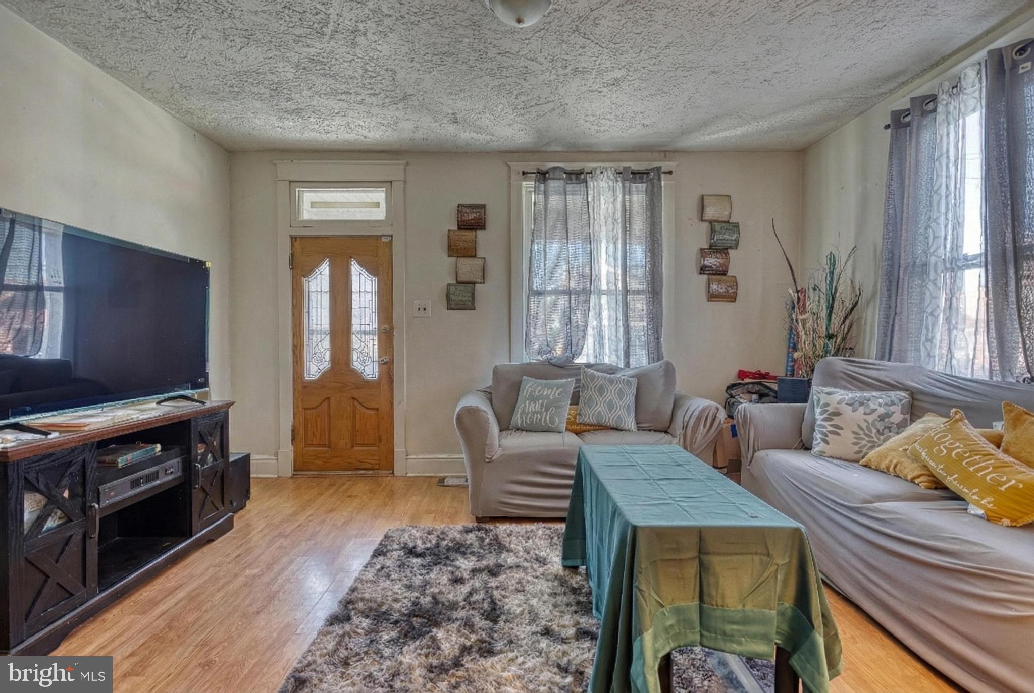 619 Dallas Street York, PA 17403 - Photo 5 of 23 a living room with furniture and a flat screen tv