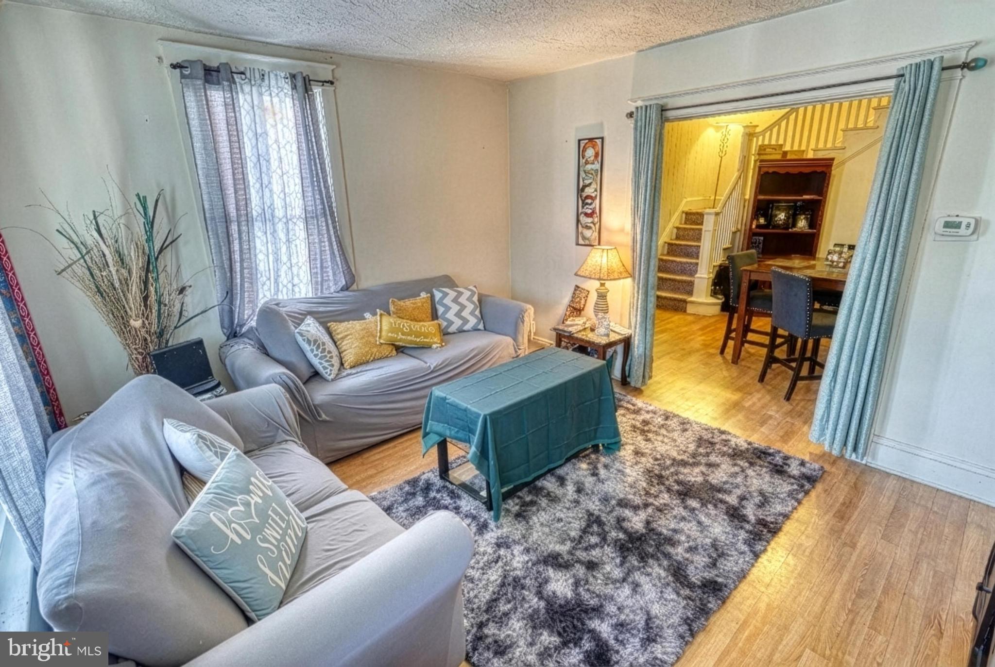 619 Dallas Street York, PA 17403 - Photo 6 of 23 a living room with furniture and a table