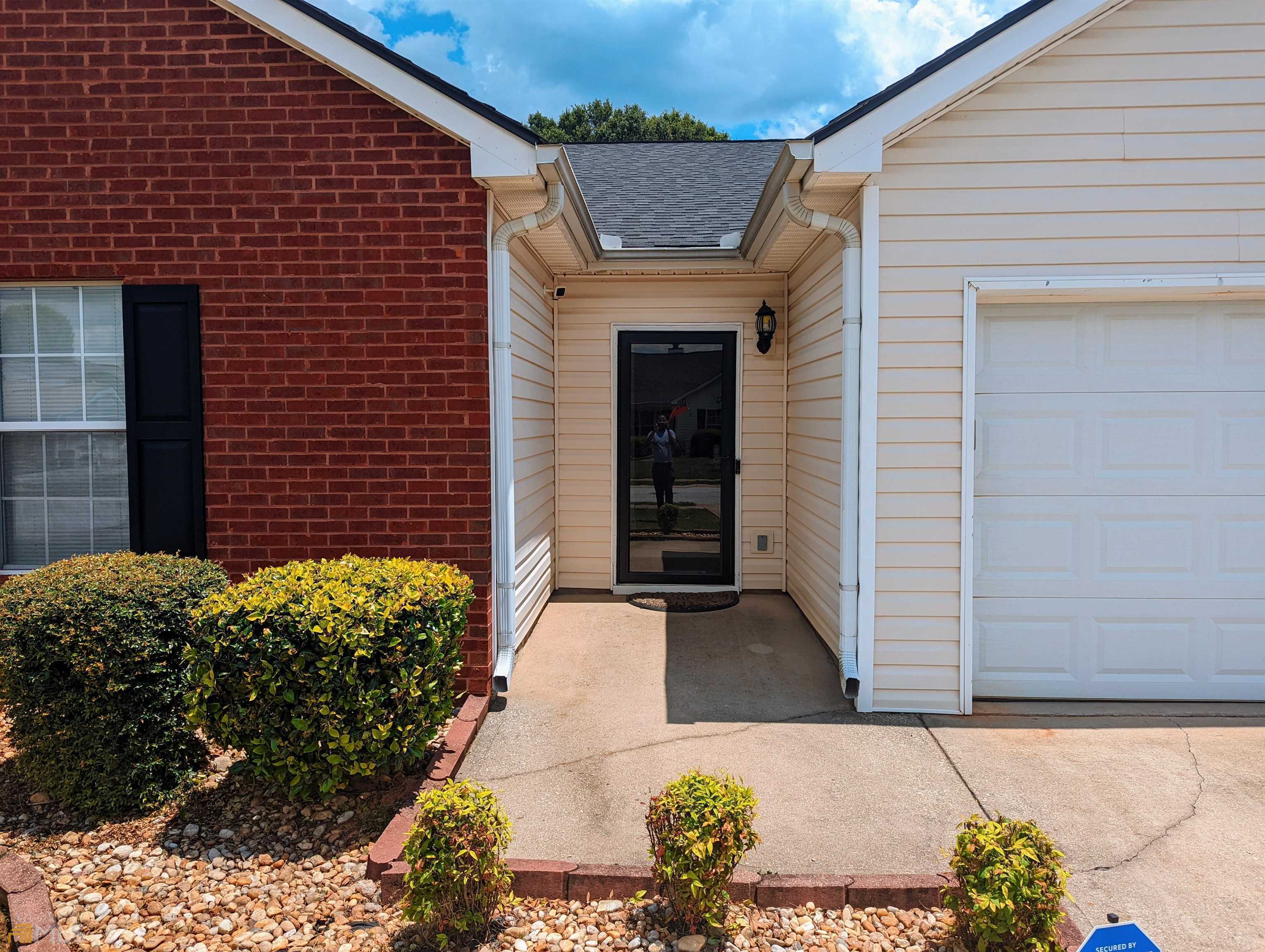 11367 Vinea Lane Hampton, GA 30228 - Photo 1 of 1 a front view of a house