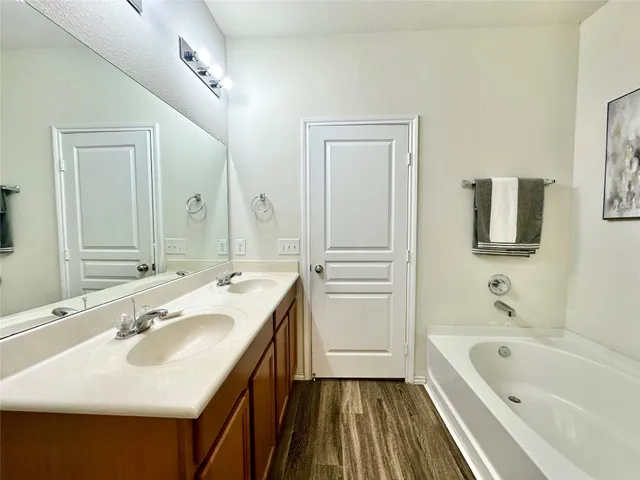 a bathroom with a sink and a bathtub