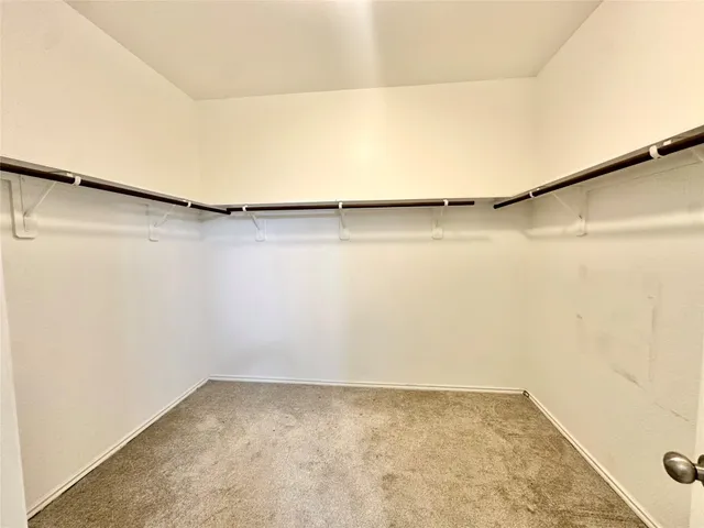 a view of a room with shelf in it