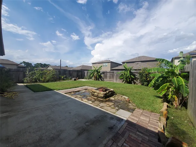 a view of a garden with a pathway