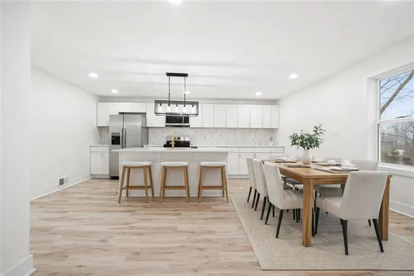 a view of kitchen with breakfast area