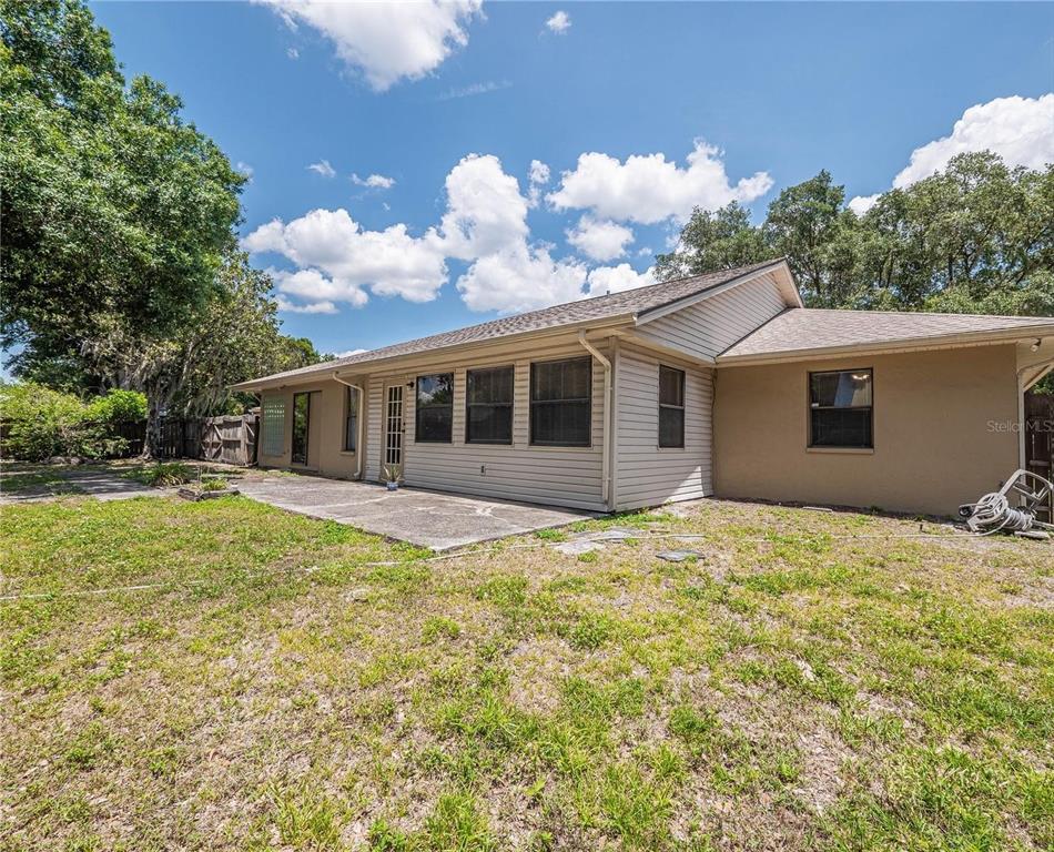 4232 Stone Henge Road Mulberry, FL 33860 - Photo 11 of 12 a house with swimming pool in front of it