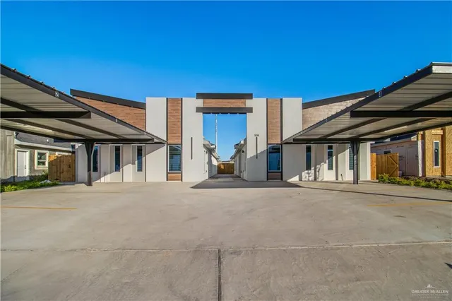 a view of a house with a street