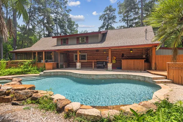 front view of a house with swimming pool