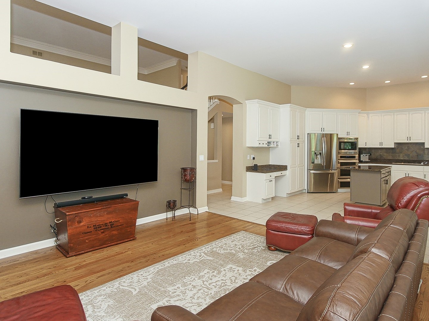 261 Course Drive Lake In The Hills, IL 60156 - Photo 11 of 35 a living room with furniture and a flat screen tv