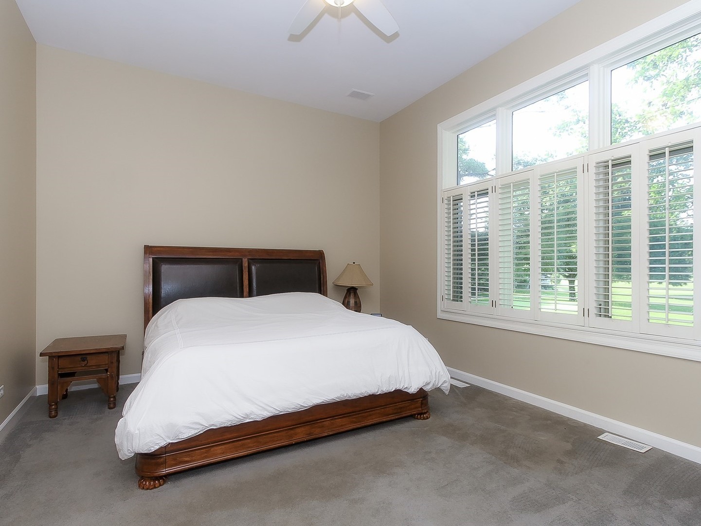 261 Course Drive Lake In The Hills, IL 60156 - Photo 13 of 35 a bedroom with a bed and a window