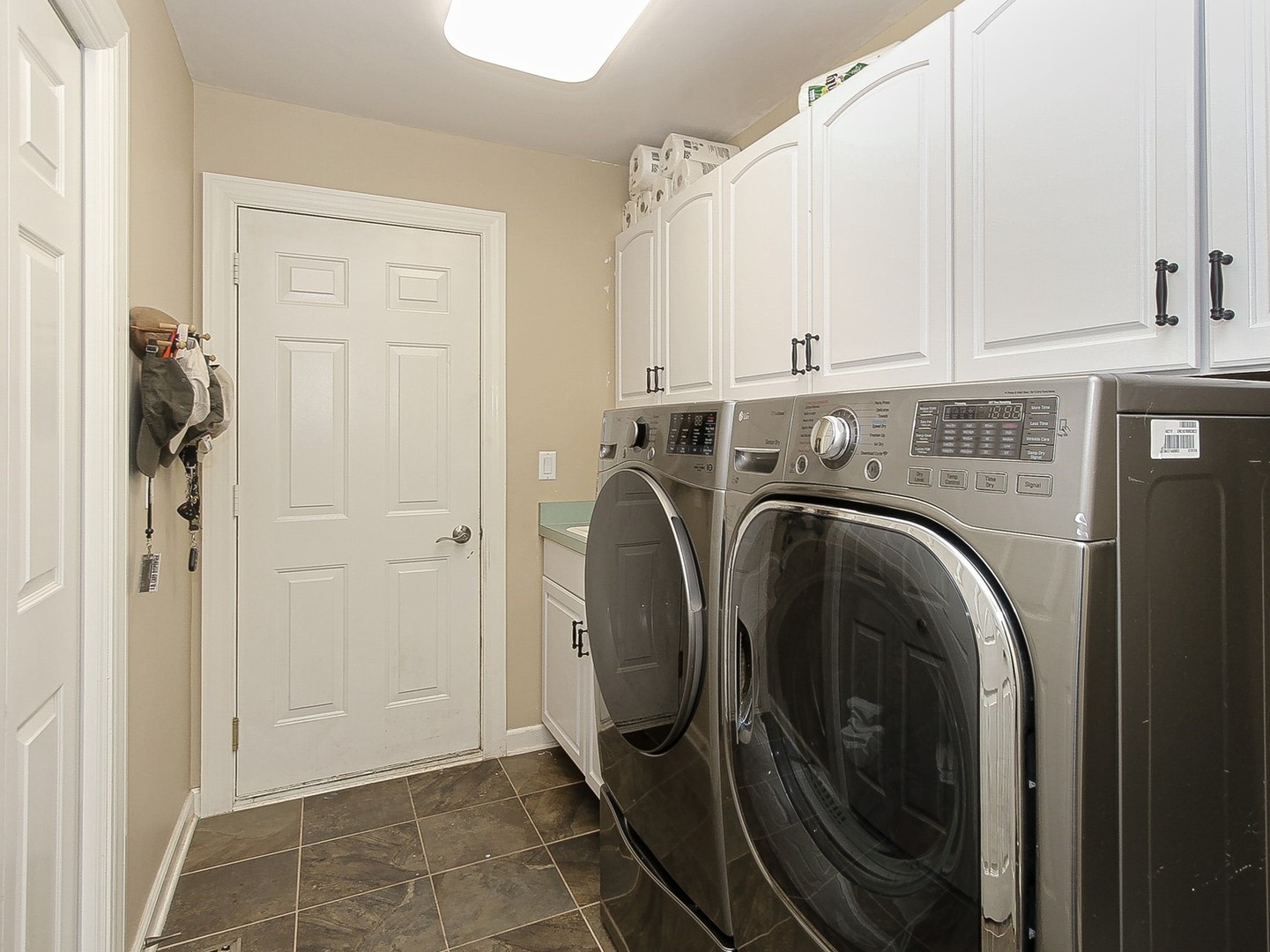 261 Course Drive Lake In The Hills, IL 60156 - Photo 16 of 35 a utility room with dryer and washer