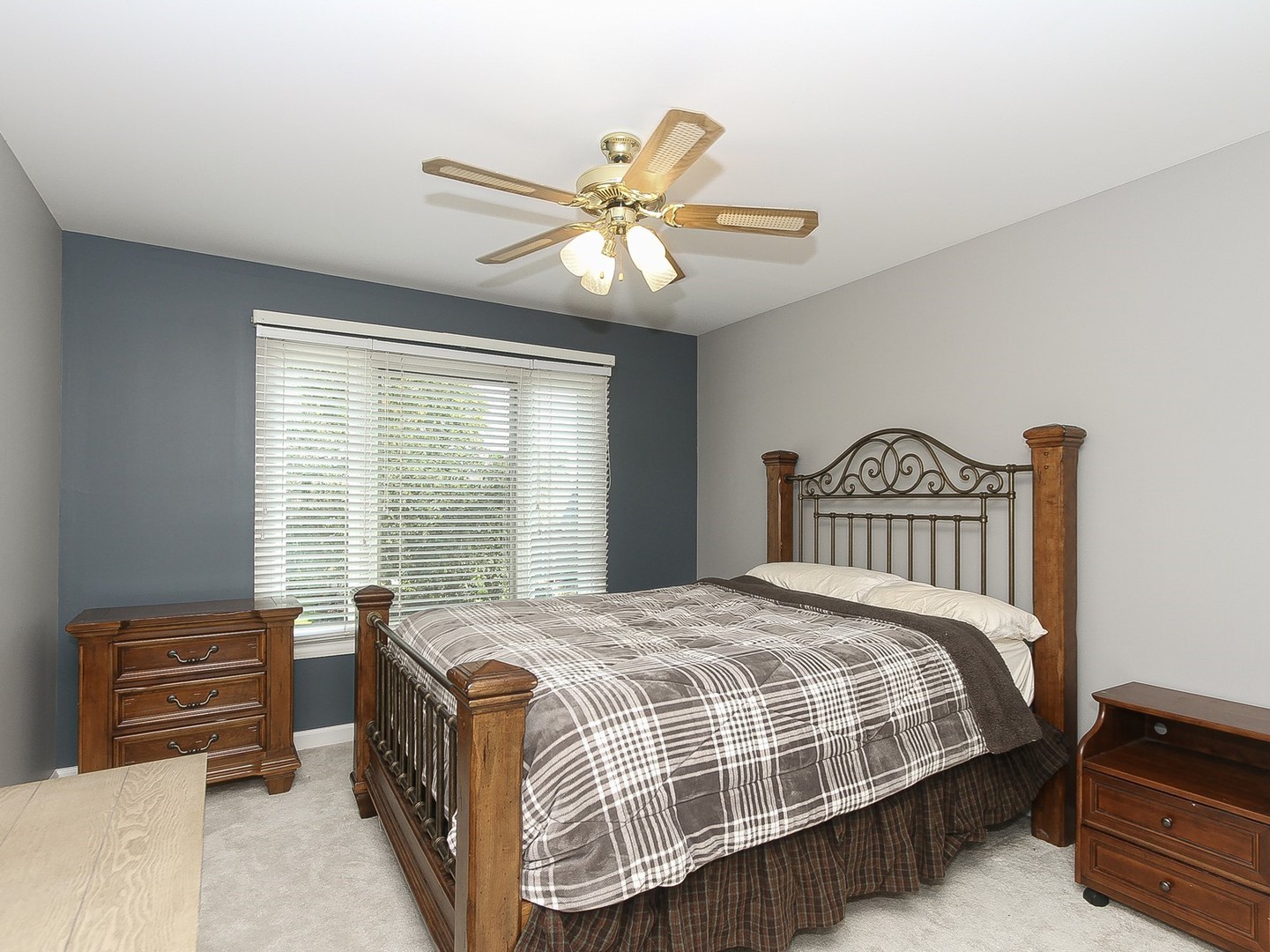 261 Course Drive Lake In The Hills, IL 60156 - Photo 17 of 35 a bedroom with a bed and a chandelier