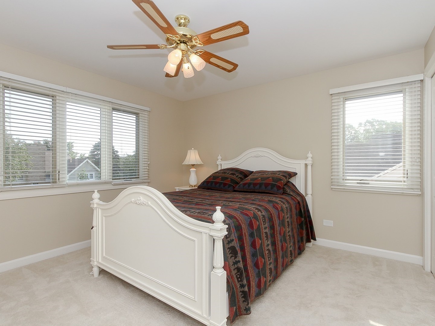 261 Course Drive Lake In The Hills, IL 60156 - Photo 20 of 35 a bedroom with a bed and a large window