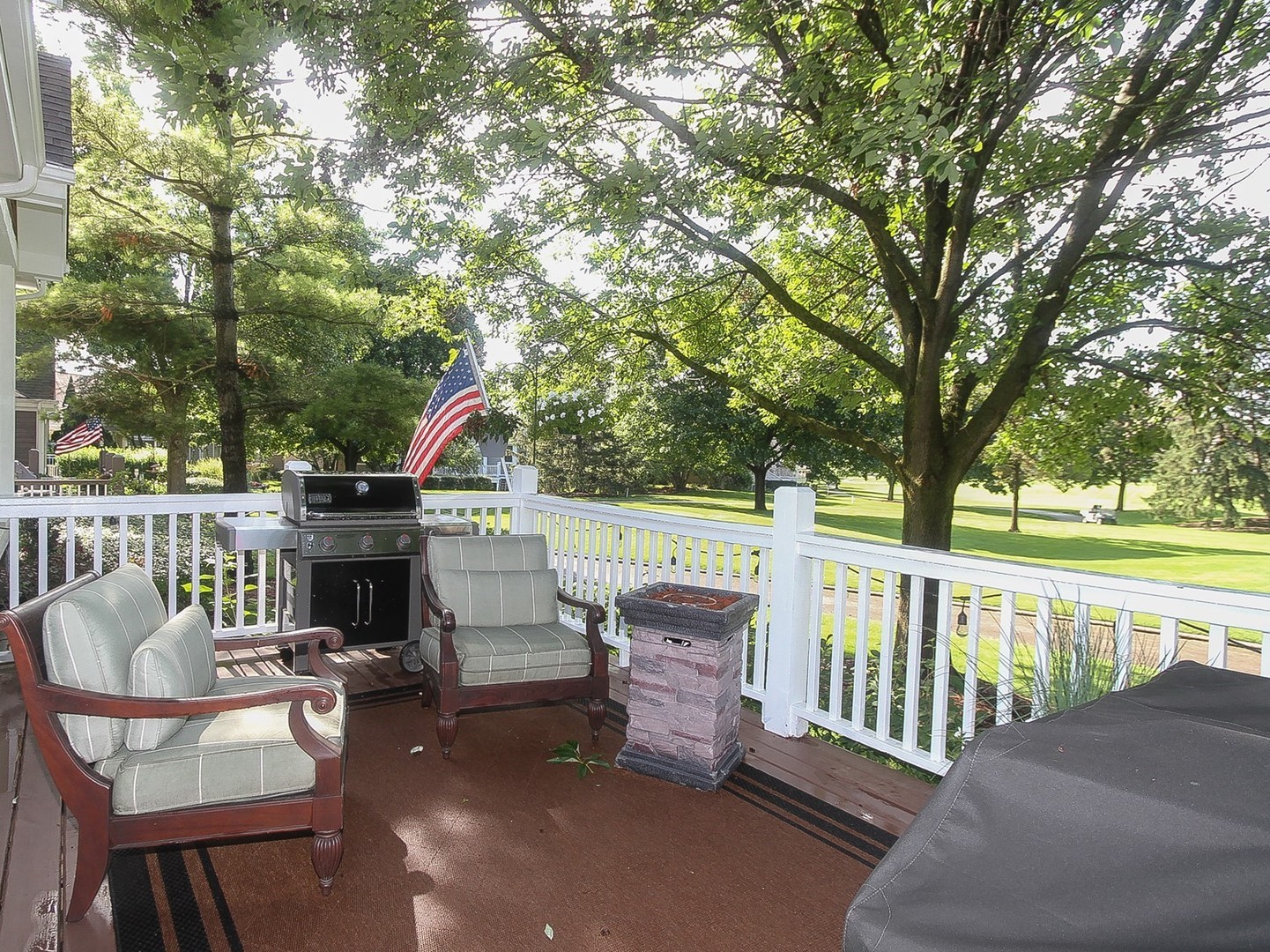 261 Course Drive Lake In The Hills, IL 60156 - Photo 24 of 35 a view of a balcony with chairs and wooden fence