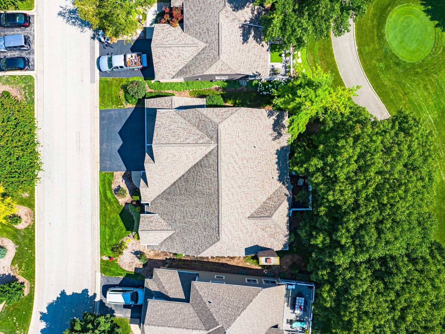 261 Course Drive Lake In The Hills, IL 60156 - Photo 31 of 35 an aerial view of a house with a yard and potted plants