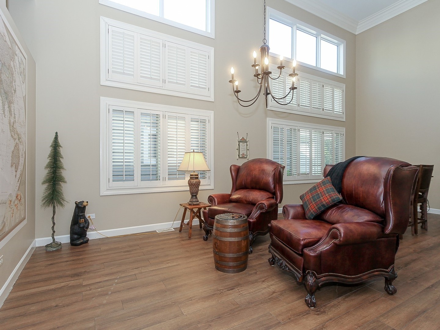 261 Course Drive Lake In The Hills, IL 60156 - Photo 6 of 35 a living room with furniture chandelier and wooden floor