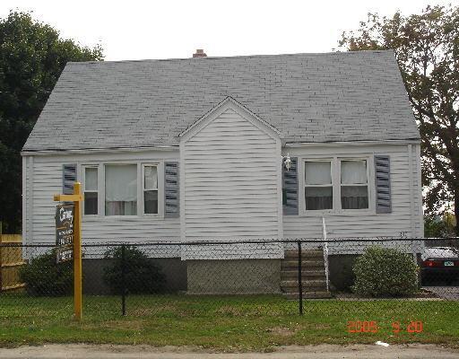 230 Dayton Road Bridgeport, CT 06606 - Photo 1 of 1 a front view of a house with a yard