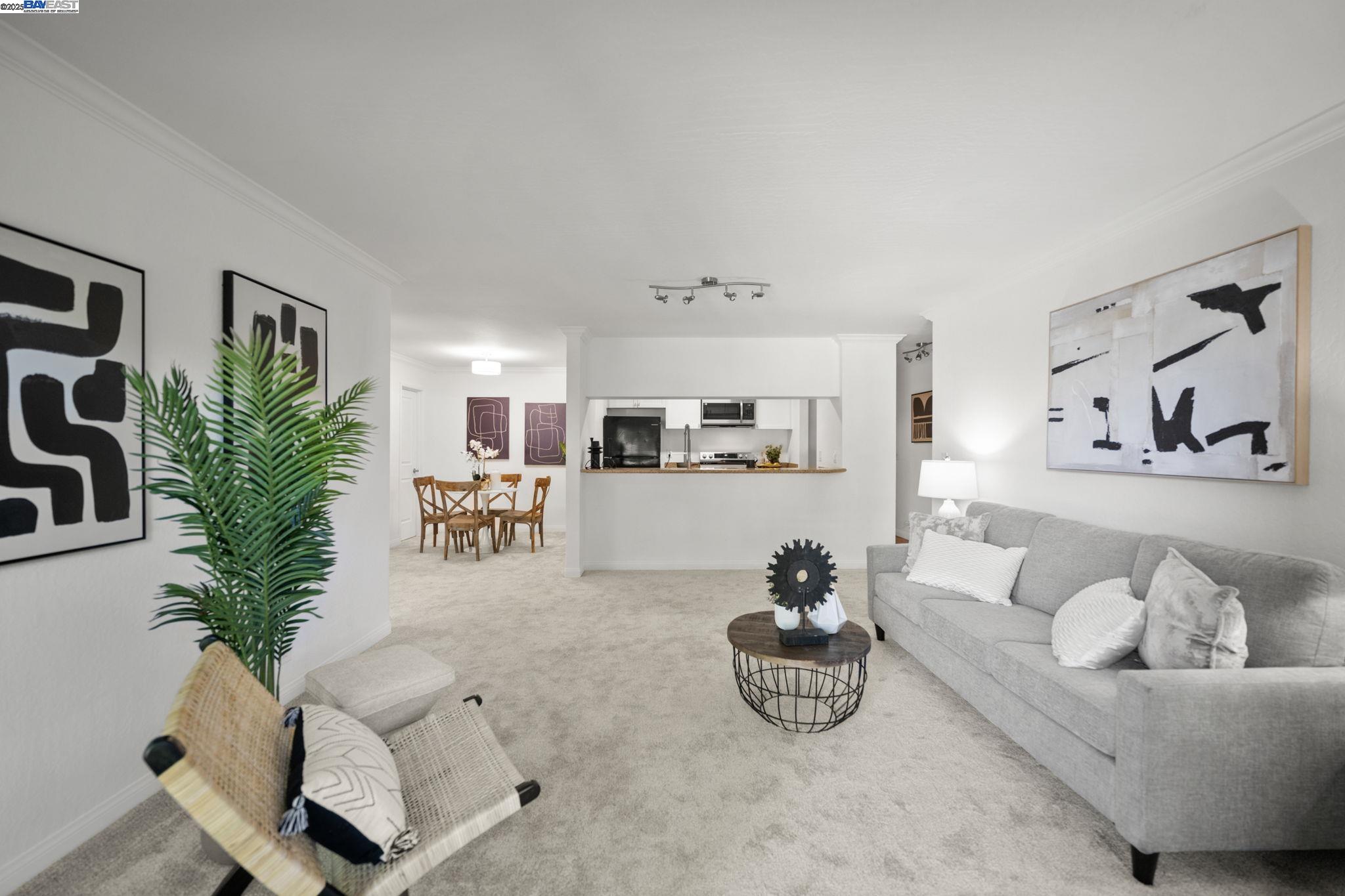 1085 Murrieta Boulevard, Unit 222 Livermore, CA 94550 - Photo 12 of 25 a living room with furniture and a potted plant