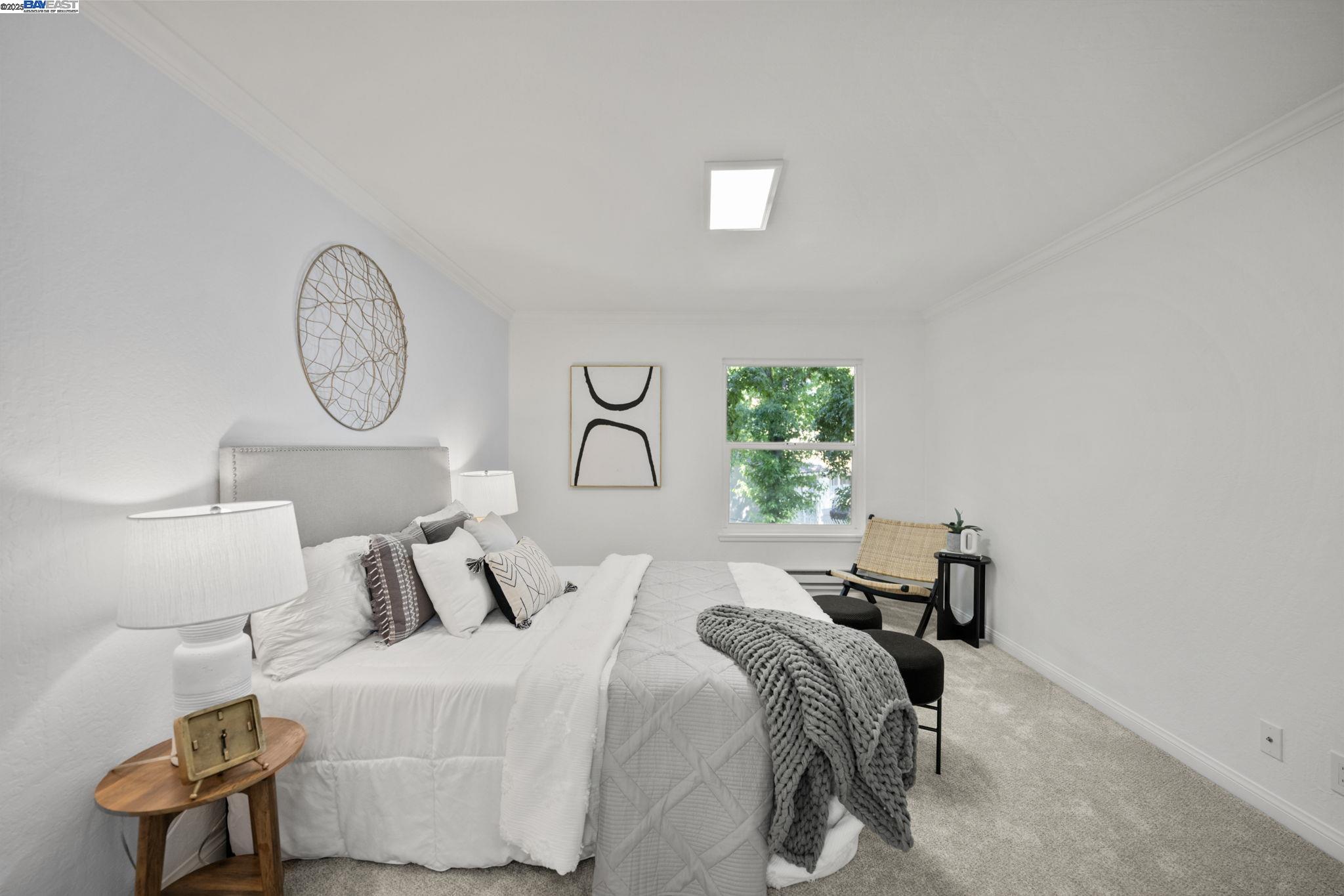 1085 Murrieta Boulevard, Unit 222 Livermore, CA 94550 - Photo 16 of 25 a bedroom with a bed and a window