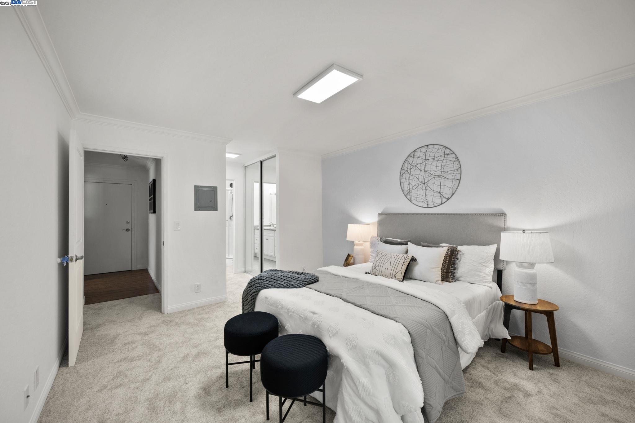 1085 Murrieta Boulevard, Unit 222 Livermore, CA 94550 - Photo 17 of 25 a bedroom with bed and a table