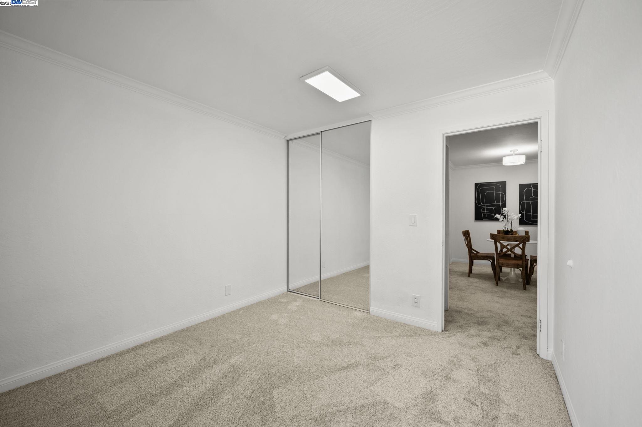 1085 Murrieta Boulevard, Unit 222 Livermore, CA 94550 - Photo 22 of 25 an empty room with closet and a bathroom