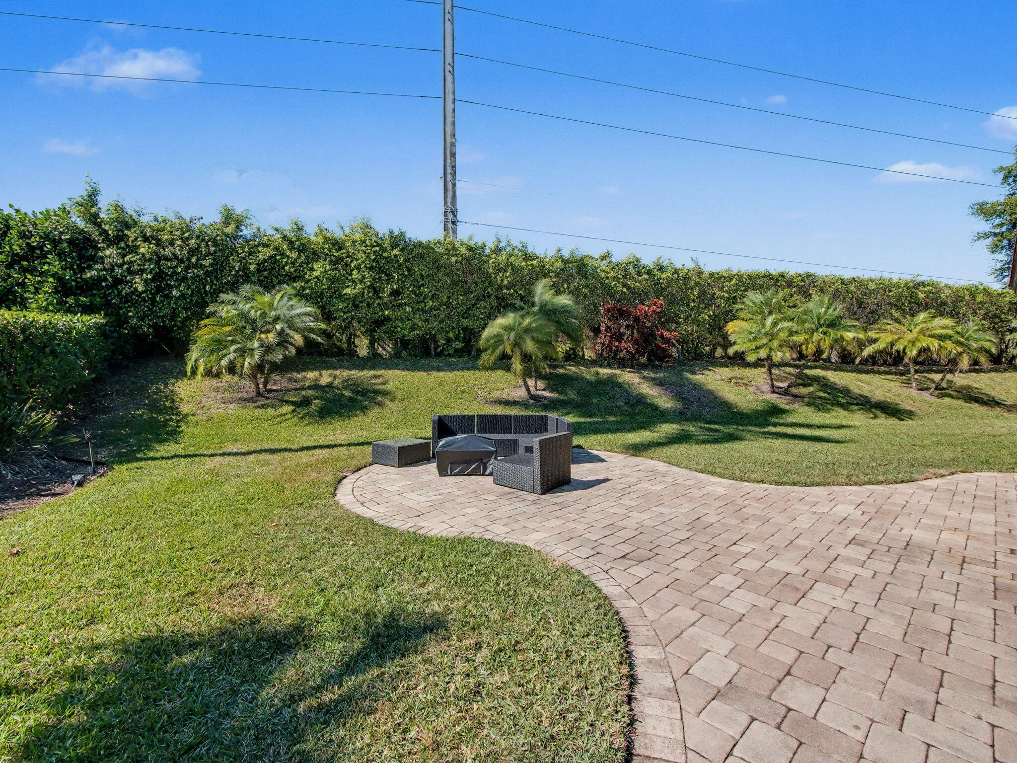 720 Muirfield Circle Atlantis, FL 33462 - Photo 11 of 20 a view of a garden with an empty space